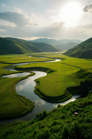 Beautiful summer landscape in the mountains. Green meadows and riverの素材