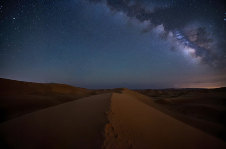 Milky Way over sand dunes in the Sahara desert, Moroccoの素材