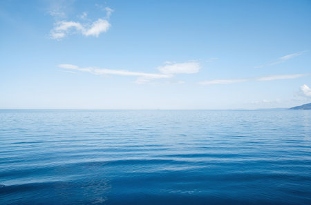 Reflection of trees in the lake in the autumn forest and skyの素材