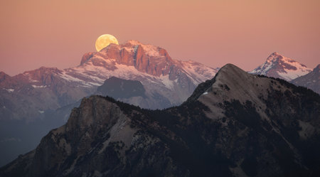 Moonrise over the mountains in Alps. Italian Dolomites.の素材
