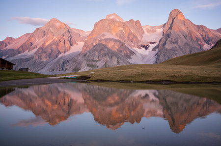 Reflection of the mountains in the lake, Val di Funes, Italyの素材