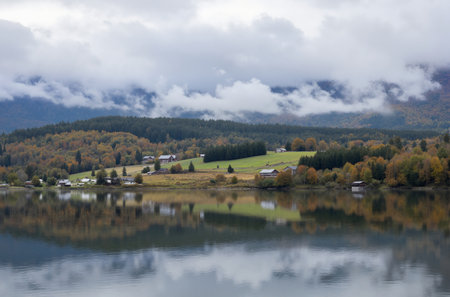 Autumn Landscape with lake and mountains in the background, Norwayの素材