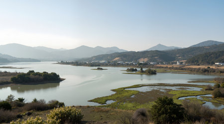 Panoramic view of the lake and mountains in the background.の素材