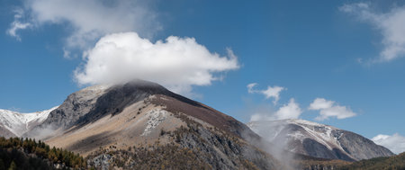 Panoramic view of the snow-capped mountains in the autumnの素材