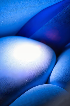 blue abstract background with bokeh defocused lights and shadow.の素材