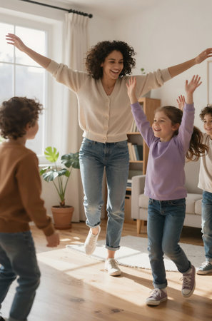 Cheerful young mother dancing with her kids in living room at homeの素材