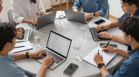 Group of multiethnic business people working together in office, top viewの素材