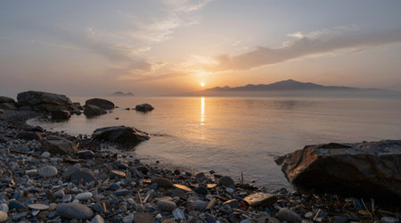 Beautiful seascape at sunset. Sea and mountains in the background.の素材
