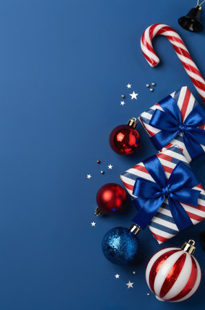 Christmas or New Year decoration on blue background. Top view with copy space.の素材