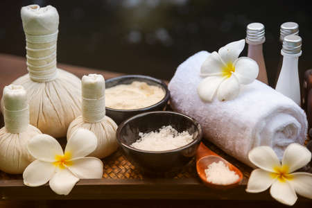 Spa massage compress balls, herbal ball on the wooden with treaments spa , Thailand, soft and select focusの写真素材