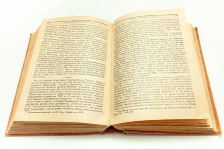 unrolled old book on white backgroundの写真素材