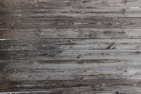 background of an old wooden wall with  snowの写真素材