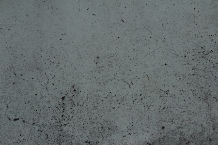 dirt and on the concrete wall backgroundの写真素材