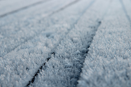 snow or hoarfrost on wooden boards, a background textureの写真素材