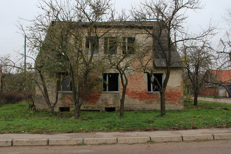 the old and strongly destroyed house in the village,another perspectiveのeditorial素材