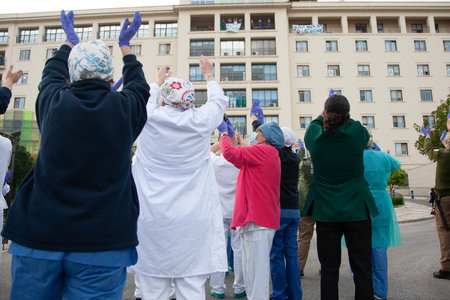 Malaga, Spain. 11th Apr 2020. Covid-19 Tribute applause to health personnel of the Hospital Carlos...