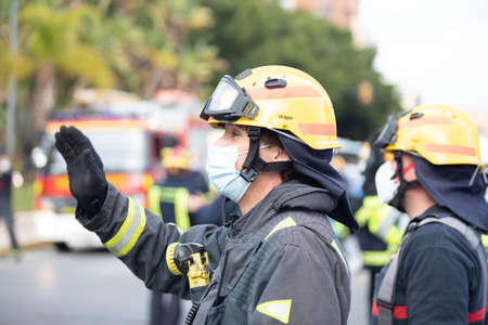 Malaga, Spain. 16th Apr 2020. Covid-19 Tribute applause to health personnel of the Hospital Carlos Haya of Málaga from local Police and Firemen.のeditorial素材