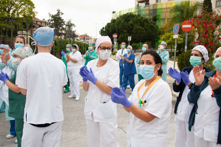 Malaga, Spain. 16th Apr 2020. Covid-19 Tribute applause to health personnel of the Hospital Carlos Haya of Málaga from local Police and Firemen.のeditorial素材