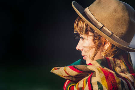 Young blonde boho female beauty on a nature backgroundの写真素材