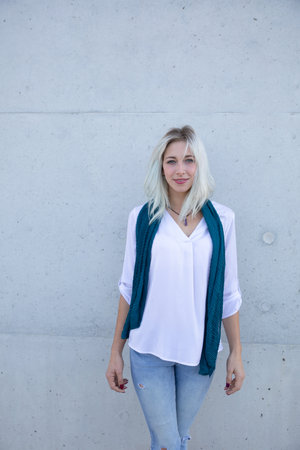 a elegant and confident professional young blonde woman posing around the officeの写真素材