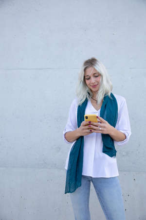 a elegant and confident professional young blonde womanの写真素材
