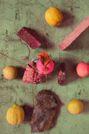 Still Life yellow and green lemons composition in a stone backgroundの写真素材