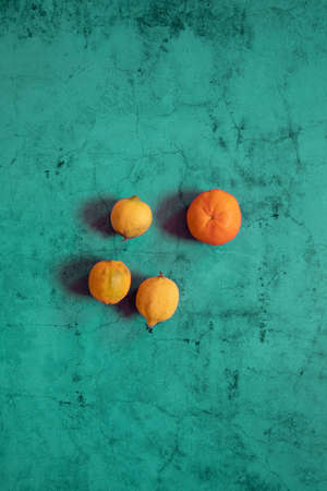 Still Life oranges composition in a blue stone backgroundの写真素材