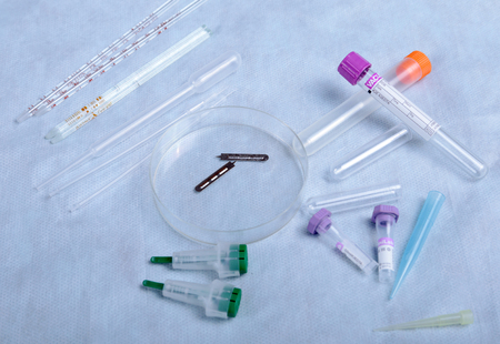 Medical instruments for doctor on blue tableの写真素材