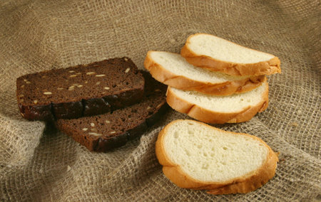Bread with tomato, chili and garlic on wood.