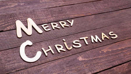 Christmas collection, gifts box, tree and decorative ball, on wood backgroundの写真素材