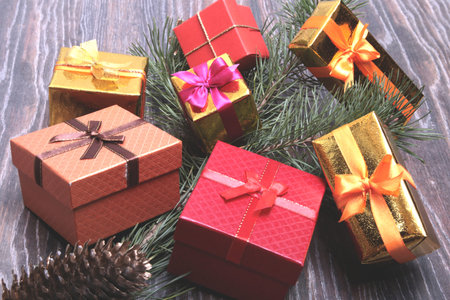 Christmas collection, gifts box, tree and decorative ornaments, on rustic wood