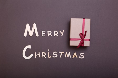 Merry Christmas. Christmas greeting card and gift box. Xmas backgroundの写真素材