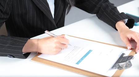 business woman working on computer at office.の写真素材