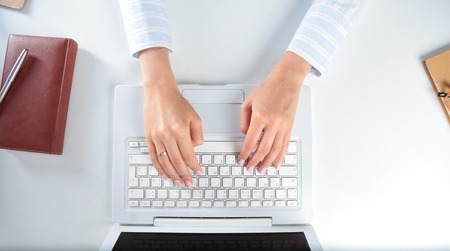 business woman working on computer at office.の写真素材