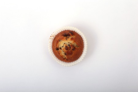 Fresh homemade muffins on white background. Top view.の写真素材