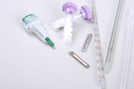 set of laboratory supplies. Petri dish, Spectrophotometer quvettes, blood test, -tube,の写真素材