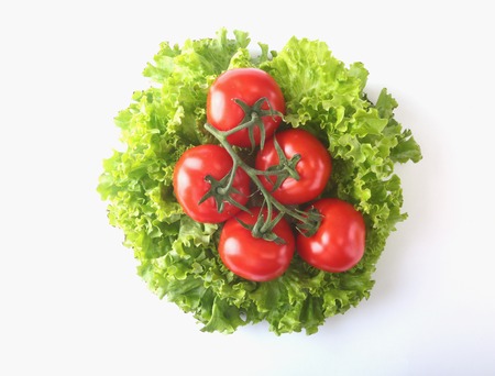 Fresh assorted vegetables with leaf lettuce. Isolated on white background. Selective focus.の写真素材