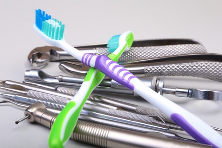 dental care toothbrush with dentist tools isolated on white background. Selective focus.の写真素材
