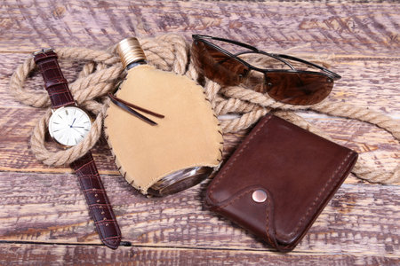Mens accessories for business and rekreation. A professional studio photograph of mens business accessories. Top view compositionの写真素材