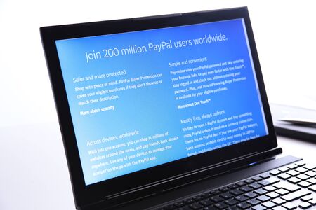 New York, USA - March 25, 2019: Illustrative Editorial of Website of Paypal visible on display screen. Paypal is an American online payment and banking company.のeditorial素材