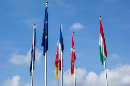 Flags of the European Union hanging from the mast