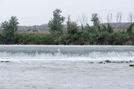 The river Ebro on its way through Escatron, Aragonの写真素材