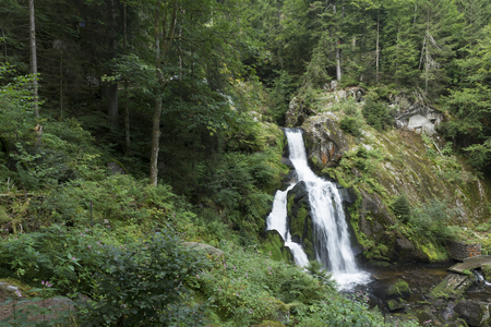 The waterfall in the village of Triverg in Germanyの写真素材