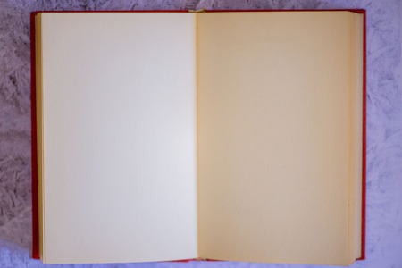 An open book with a blue backgroundの写真素材