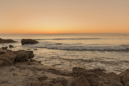 The coast of Oropesa del Mar at a sunriseの写真素材