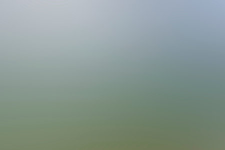 A background of a gray color from light to dark