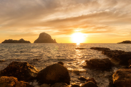 Sunset in Ibiza next to the island of Es vedraの写真素材