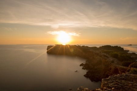Sespanyol Beach in Ibiza at sunrise, Balearic Islands, Spainの写真素材