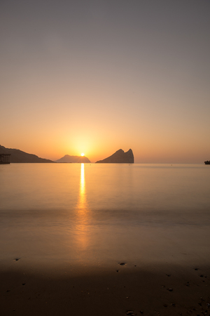 Sunrise on a beach in Aguilas, Murcia, Spainの写真素材