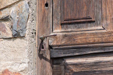 A lock on a brown wooden door, Spainの写真素材